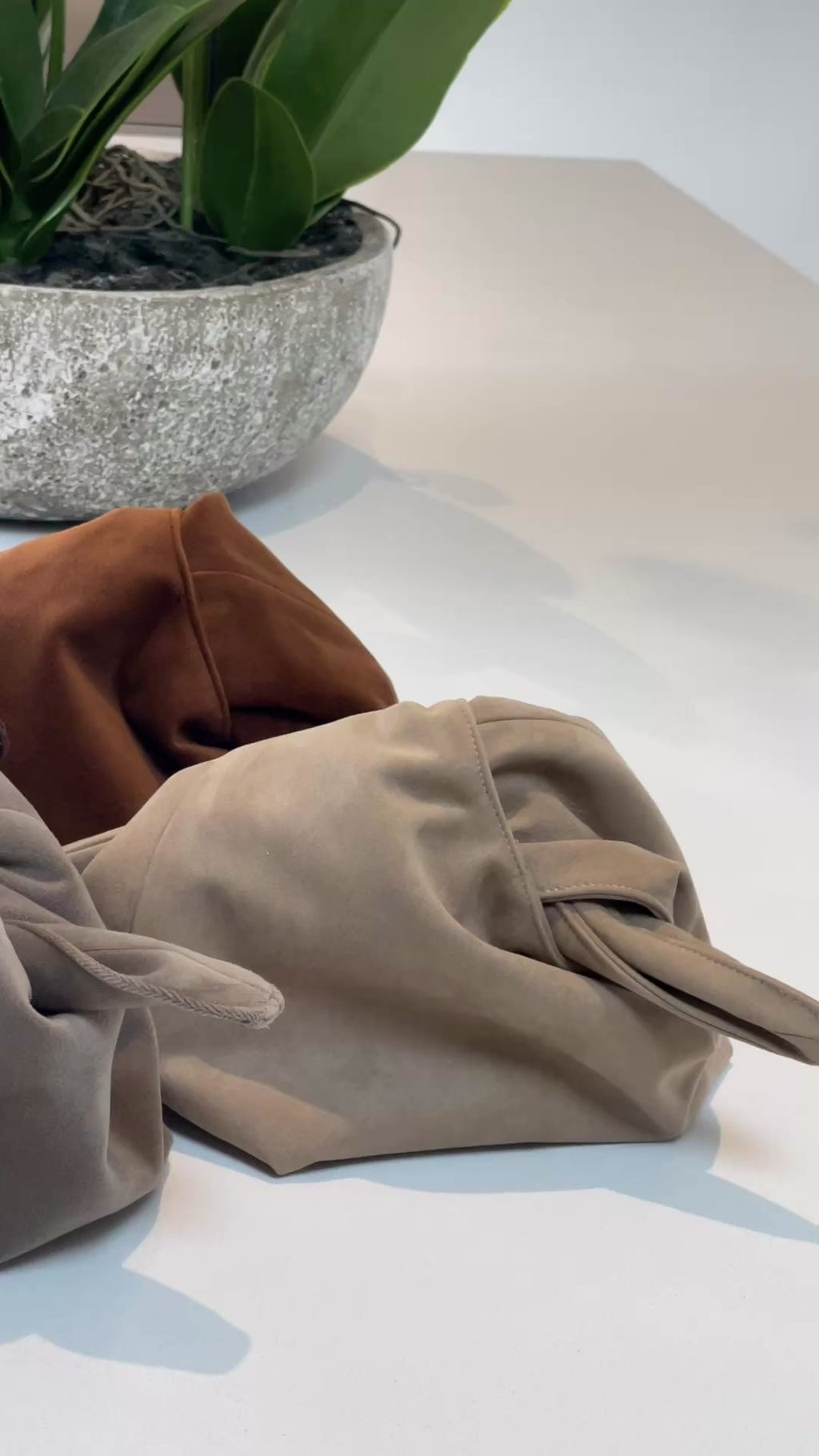 The Sand Suede Kiss Clutch Bag